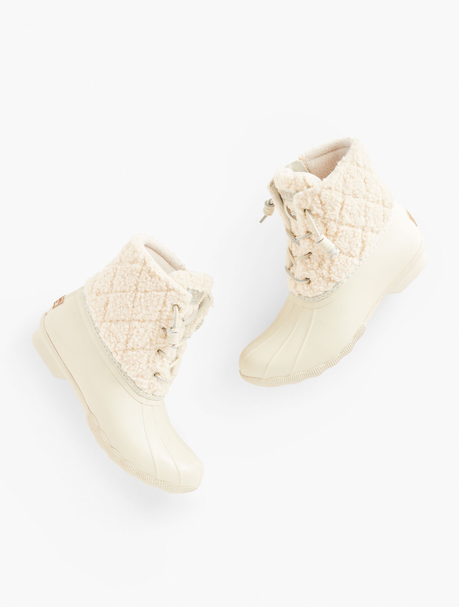 black and white sperry duck boots